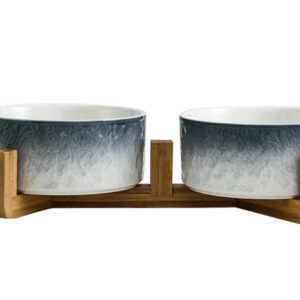 1. The bowl features a captivating surface adorned with delicate stone patterns, gradually transitioning from dark to light shades. The interior of the bowl is smooth and gentle, facilitating effortless cleaning. Crafted from high quality ceramic materials, this bowl is renowned for its exceptional hardness, durability, and easy to clean properties. 2. The wooden shelf is reinforced, ensuring robustness and resistance to breakage. It is further enhanced with a waterproof film on the surface, making it impervious to moisture. The slot design of the wooden shelf provides stability, preventing the bowl from easily tipping over. 3. This double bowl guarantees a balanced provision of both food and water, catering to the needs of your pet's nourishment.